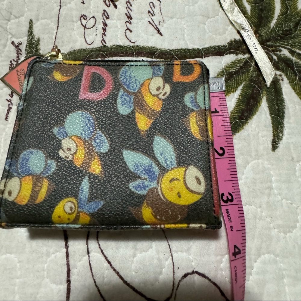 Dooney & Bourke Bumble Bee pattern wallet New no tags.